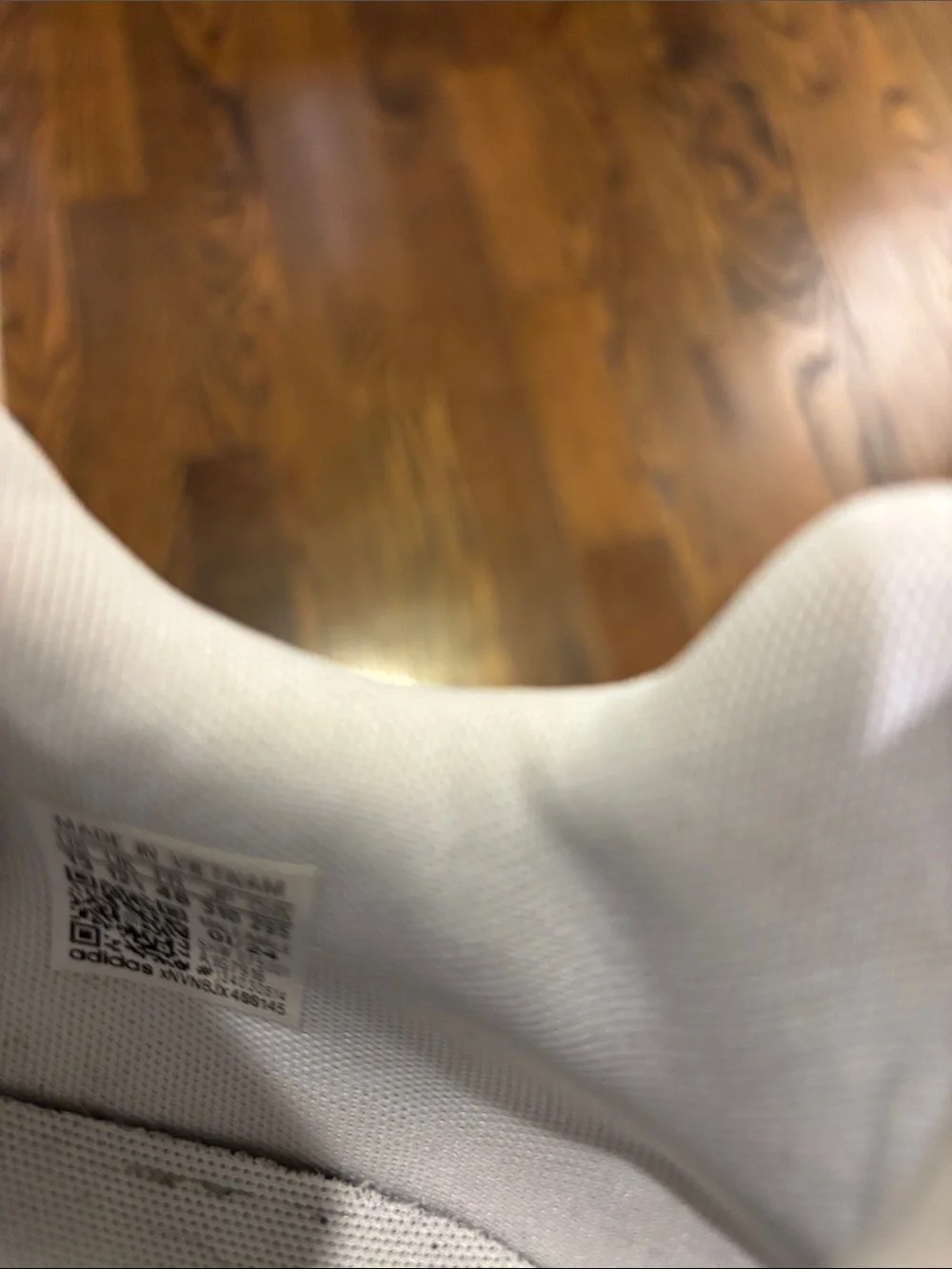 adidas Men’s All-White Low-Top Sneakers